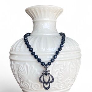 MONET art deco-style black beaded necklace with ornate pendant